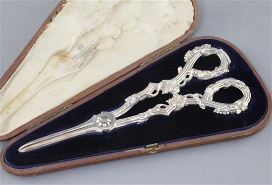 A cased pair of Victorian cast silver grape shears by Francis Higgins II, 4.5 oz.